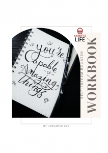 Cover for the Self-Esteem Booster Workbook depicting a notepad with the words "you're capable of amazing things" wrote on it